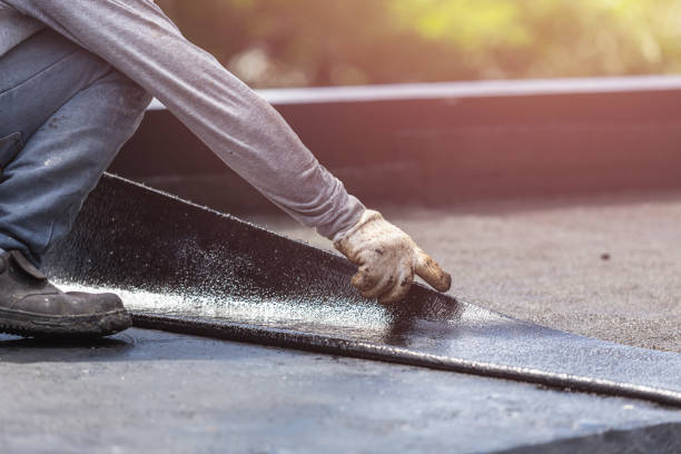Professional Basement Waterproofing technician working in Reeseville, WI